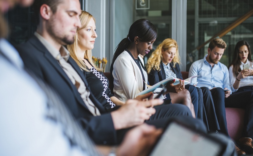 Group of people waiting for a job interview.