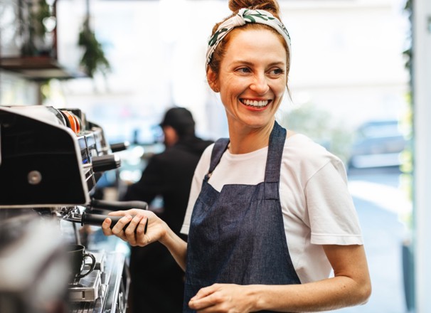 A Barista preparing coffee.