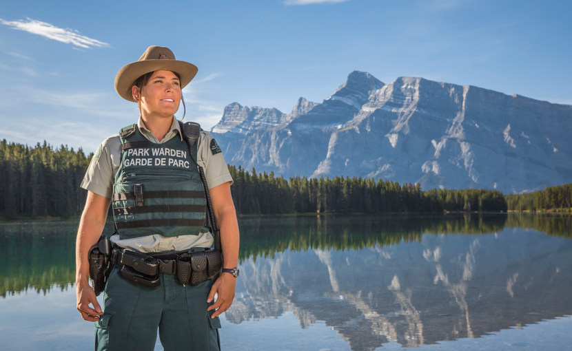 Park warden surveying Two Jack Lake, Banff National Park